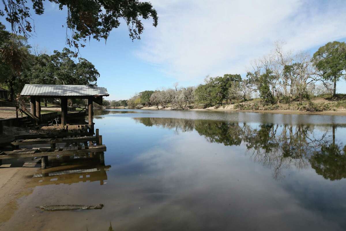 December 10, 2017: The San Bernard river is a passage way for barges including the unmanned runaway barge that severely damaged several boat docks in Sweeny, Texas. (Leslie Plaza Johnson/Freelance
