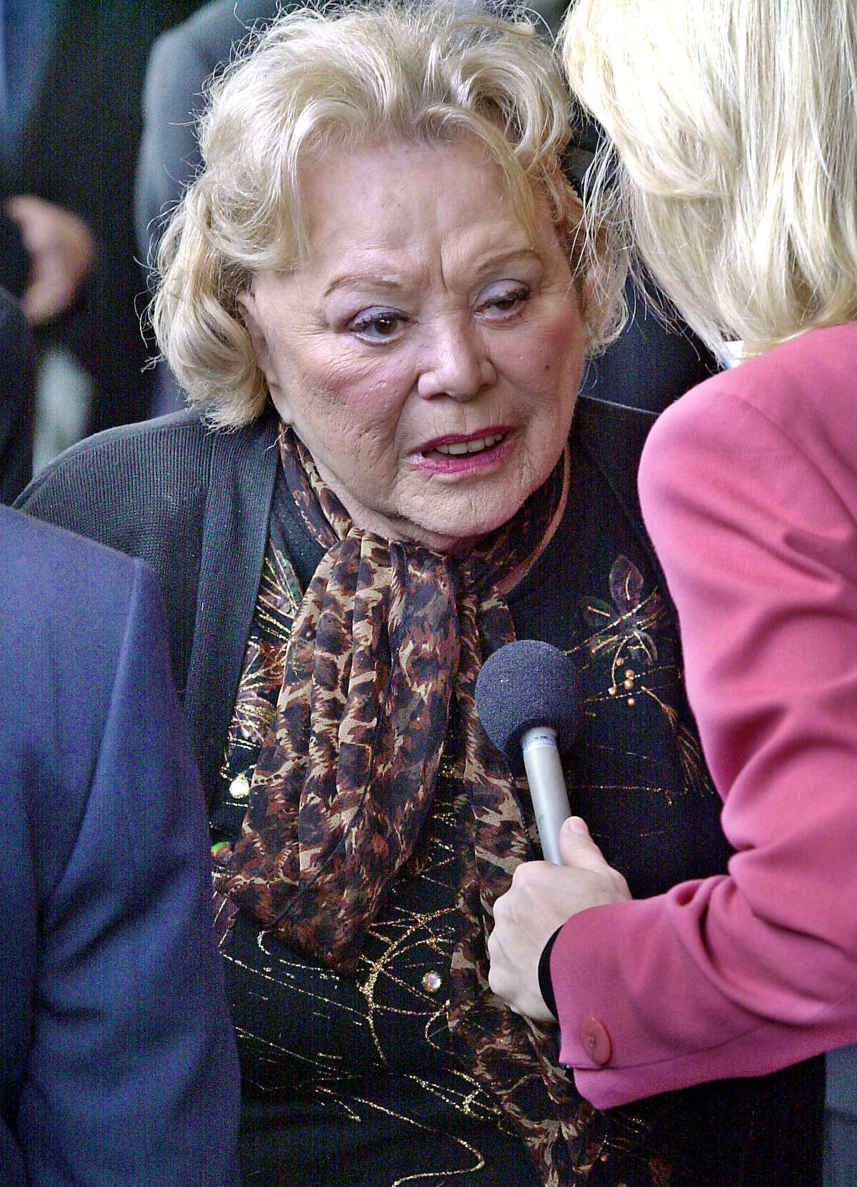 FILE- In this April 1, 2002, file photo, actress and comedian Rose Marie talks to the press as she arrives for a ceremony honoring comedian Milton Berle at Hillside Memorial Park and Mortuary in Los Angeles. Family spokesman Harlan Boll said Marie, the wisecracking Sally Rogers of ?“The Dick Van Dyke Show,?” died Thursday, Dec. 28, 2017. She was 94. (AP Photo/Nick Ut, File)
