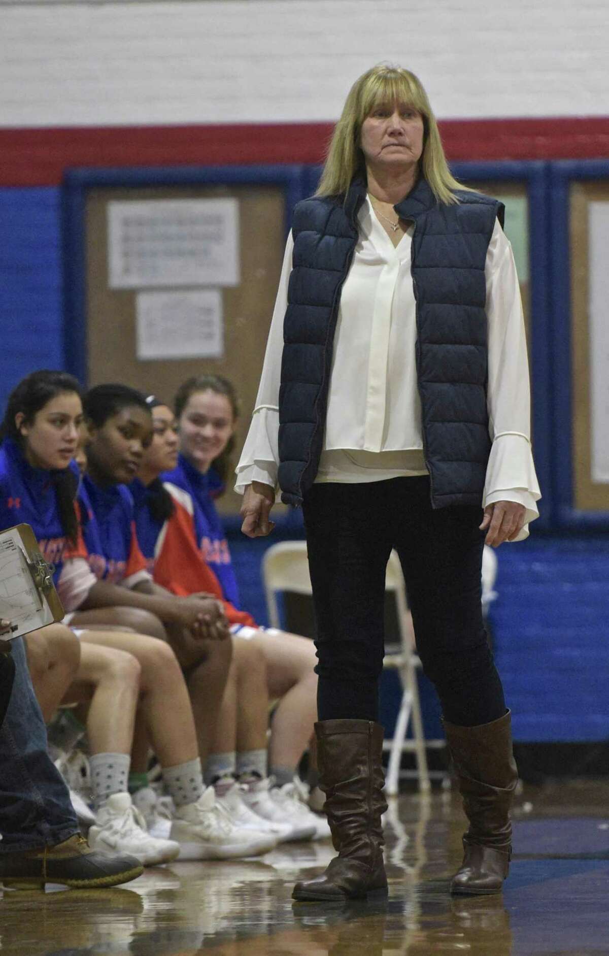 Danbury head coach Jackie DiNardo watches her team during the championship game of the 13th Annual The News-Times Greater Danbury Holiday Festival girls high school basketball tournament. Thursday, December 28, 2017, at the Danbury War Memorial, in Danbury, Conn