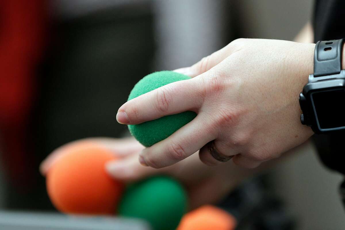 Sgt. Sabrina Reich holds sponge balls given to students to encourage them to use whatever objects are available to stop or slow down a shooter during active shooter training session presented by the UC Police on the UC Berkeley campus in Berkeley, Calif., on Tuesday, December 12, 2017.