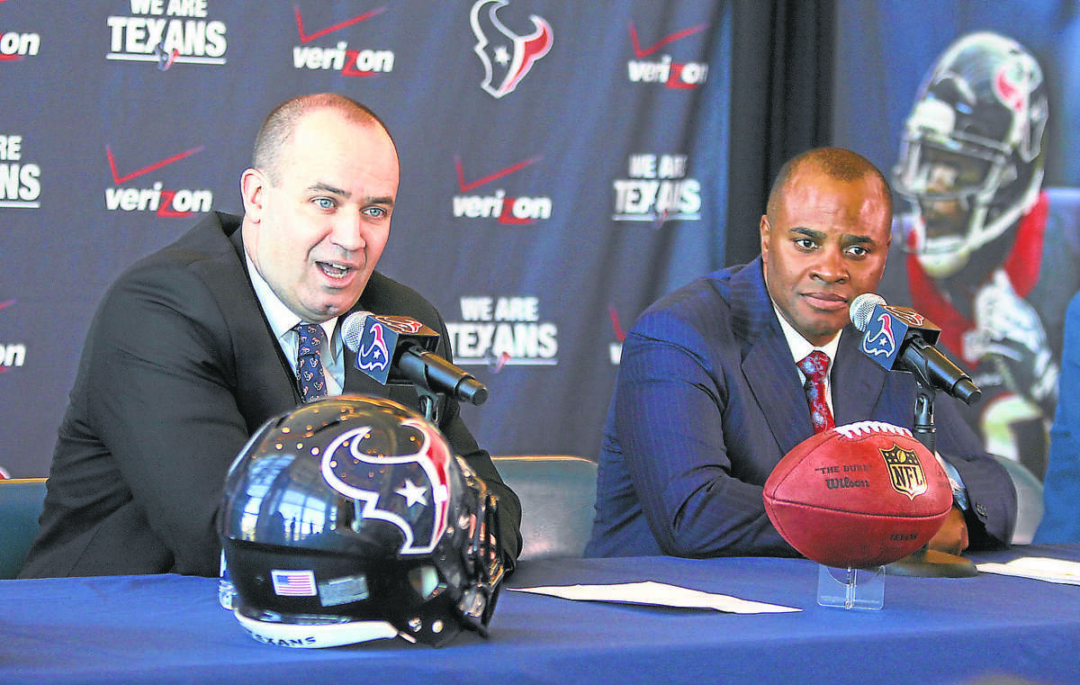 Houston Texans Head Coach Bill O'Brien and General Manager Rick Smith announce the coach's hiring on Friday, January 3, 2014.