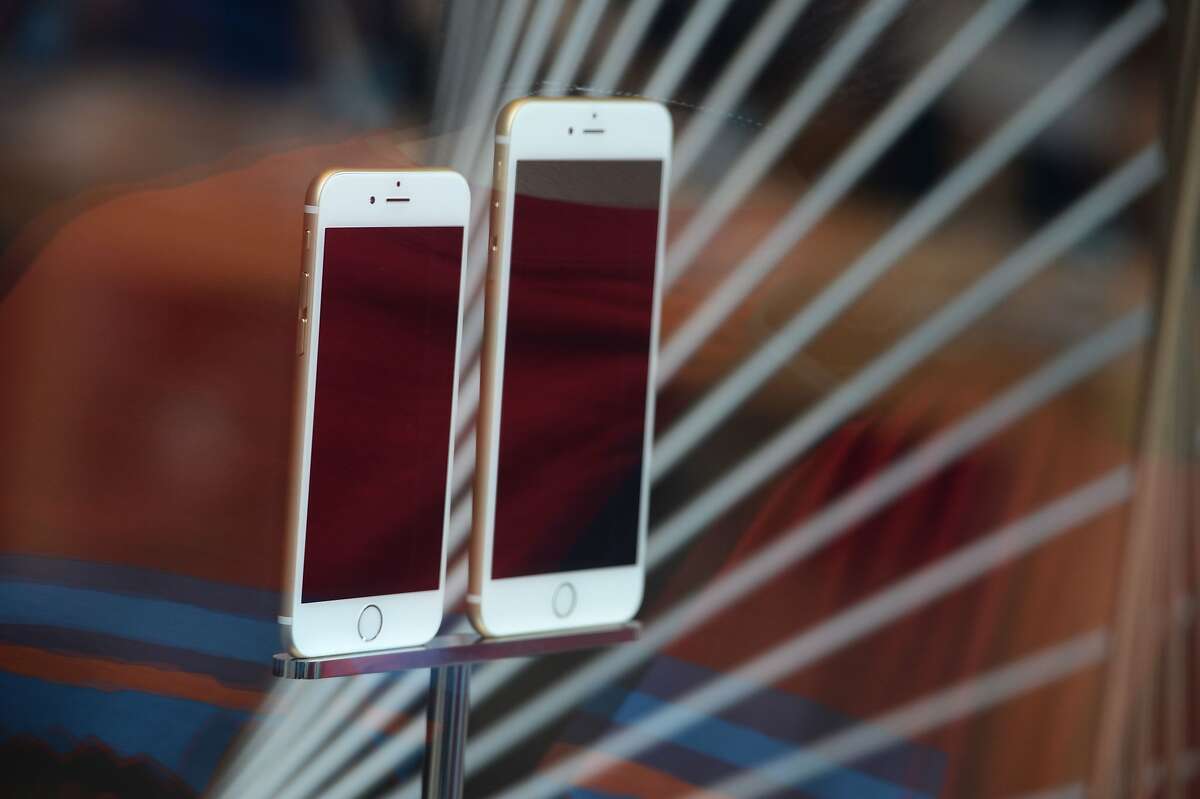 File photo dated September 19, 2014 shows the iPhone 6 and 6 Plus on display at the Apple store in Pasadena, California. 