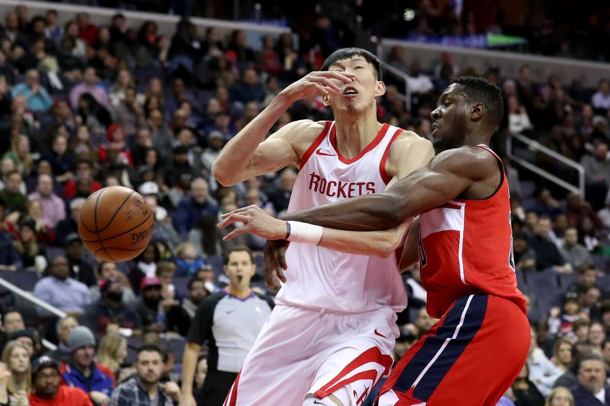 WASHINGTON, DC - DECEMBER 29: Ian Mahinmi #28 of the Washington Wizards fouls Zhou Qi #9 of the Houston Rockets in the first half at Capital One Arena on December 29, 2017 in Washington, DC. NOTE TO USER: User expressly acknowledges and agrees that, by downloading and or using this photograph, User is consenting to the terms and conditions of the Getty Images License Agreement. (Photo by Rob Carr/Getty Images)