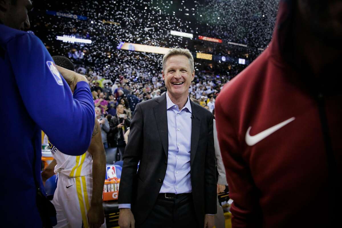 Golden State Warriors head coach Steve Kerr smiles after defeating the Cleveland Cavaliers in a game at Oracle Arena in Oakland, Calif., on Monday, Dec. 25, 2017.