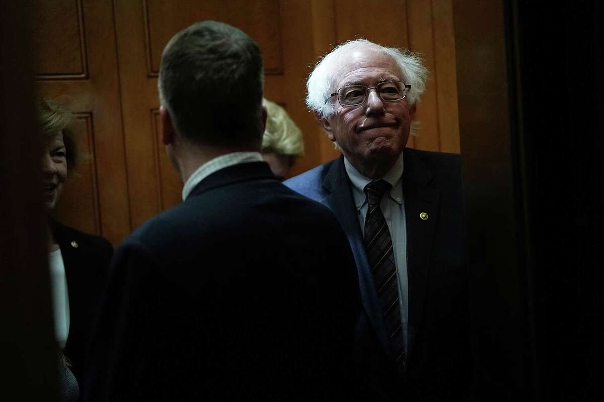 WASHINGTON, DC - DECEMBER 21: U.S. Sen. Bernie Sanders (I-VT) leaves after a vote to fund the government December 21, 2017 at the Capitol in Washington, DC. The Senate has passed a continuing resolution to temporarily fund the government through January 19, 2018. (Photo by Alex Wong/Getty Images)