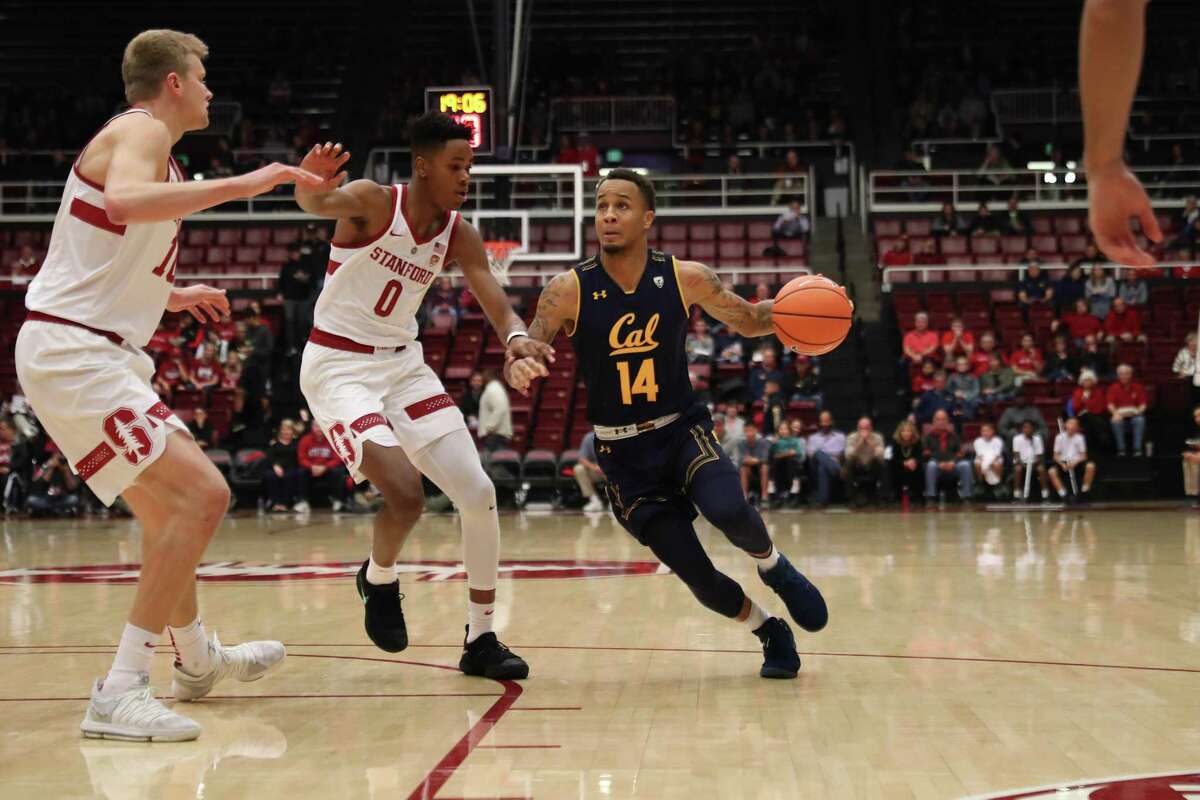 Cal Guard Don Coleman dribbles through the Stanford defense during a California vs Stanford NCAA Men's basketball Pac-12 basketball game on Saturday, December 30, 2017 at Maples Pavilion in Stanford, Calif.