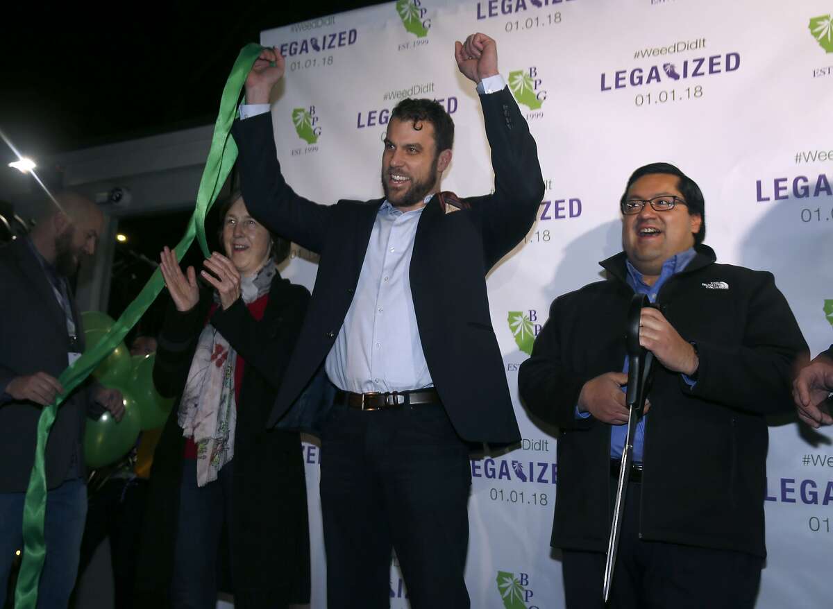 From left, state Senator Nancy Skinner, Berkeley Patients Group COO Sean Luse and Berkeley Mayor Jesse Arreguin cut the ribbon at the cannabis dispensary on the first day of legalized recreational marijuana sales in Berkeley, Calif. on Monday, Jan. 1, 2018.