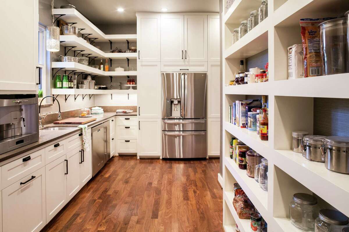 Chairma Design Group created this super pantry with extra appliances, plenty of shelving and work space, too.