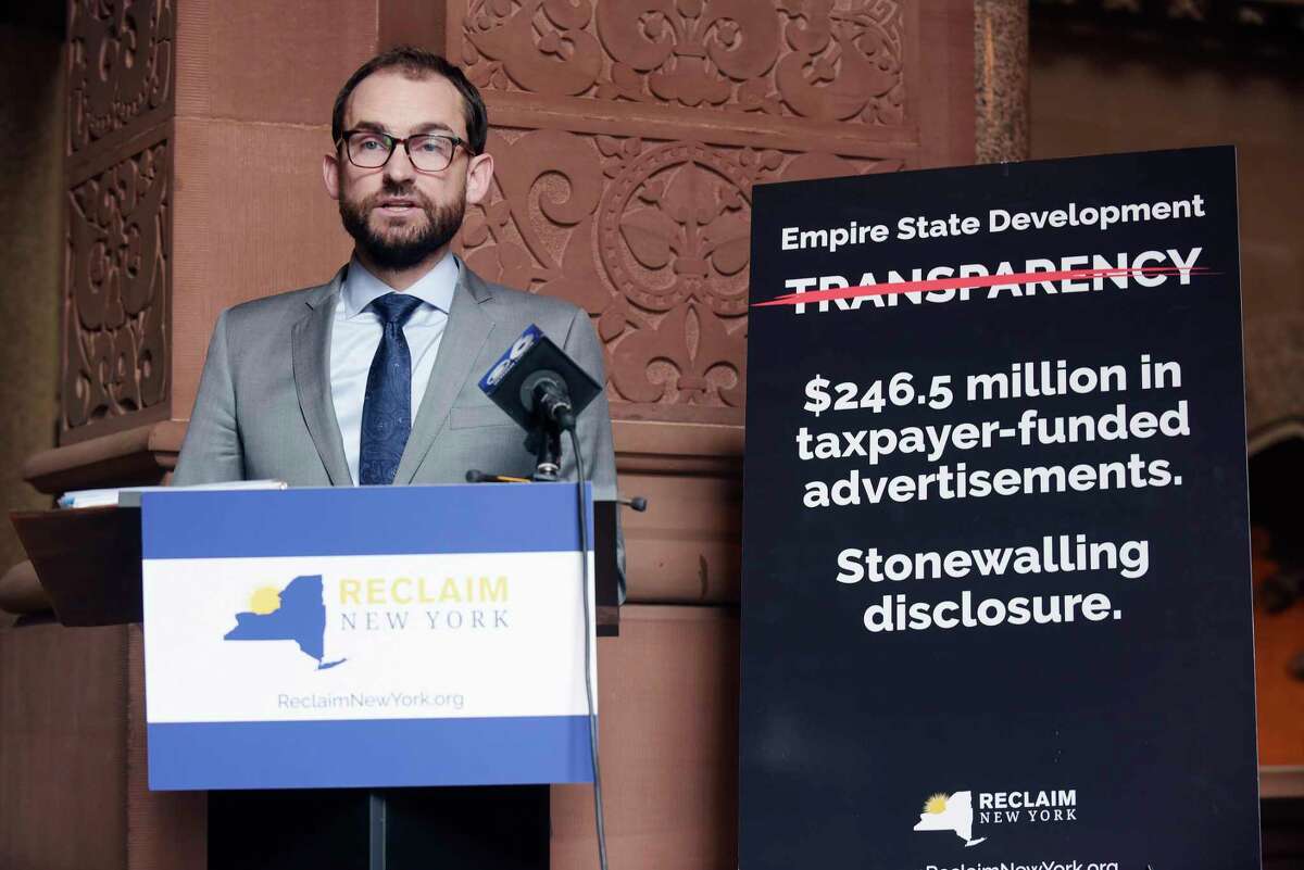 Brandon Muir, executive director of Reclaim New York, talks to the media about a lawsuit the group filed during a press conference at the Capitol on Tuesday, Jan. 2, 2018, in Albany, N.Y. The group is suing Empire State Development over a FOIA request. (Paul Buckowski / Times Union)