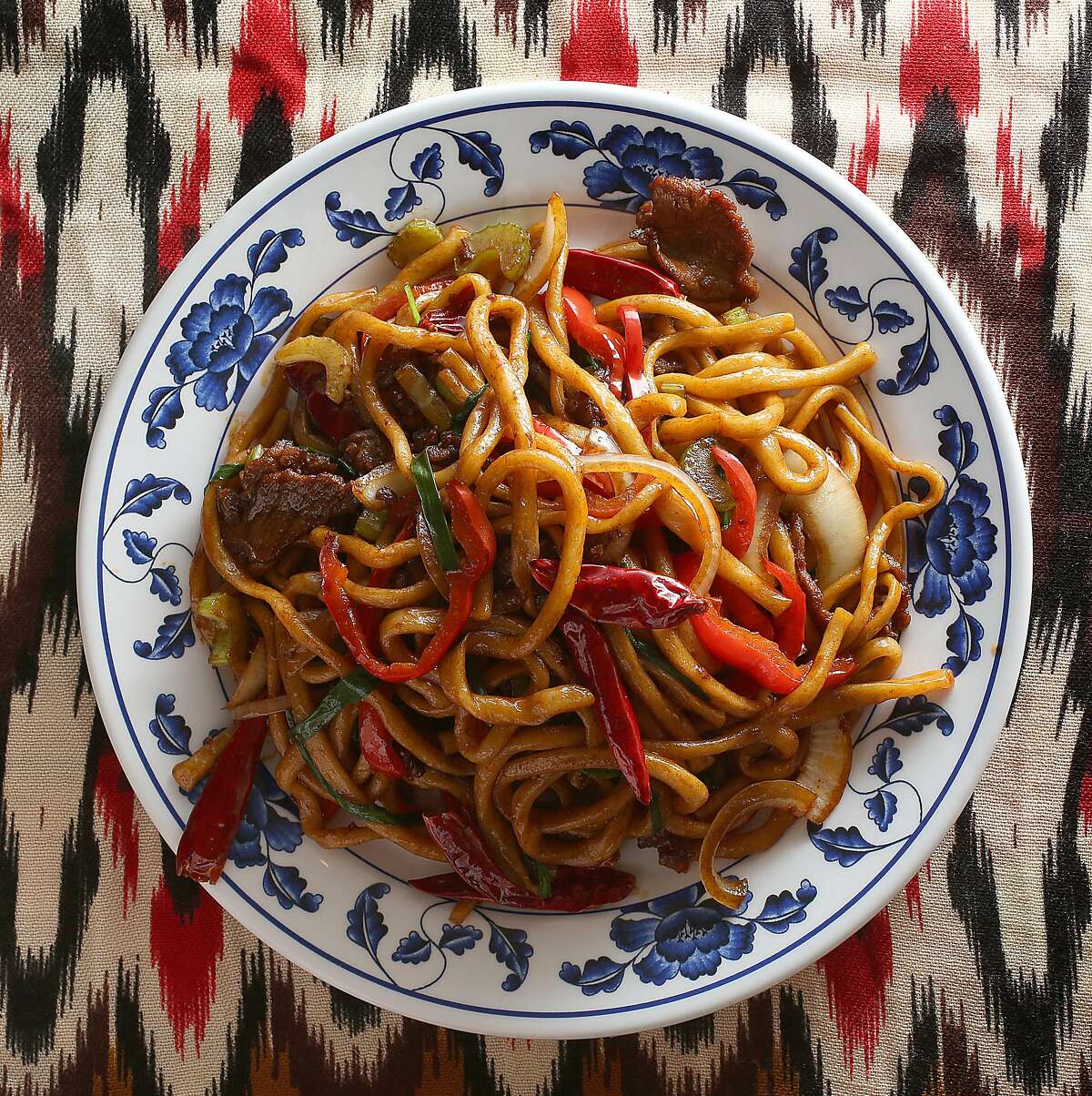 Stir fried noodles with vegetables & beef at Sama Uyghur, one of the only Uyghur (northwest Chinese and Muslim) restaurants in the Bay Area on Monday, December 18, 2017, in Union City, Ca.