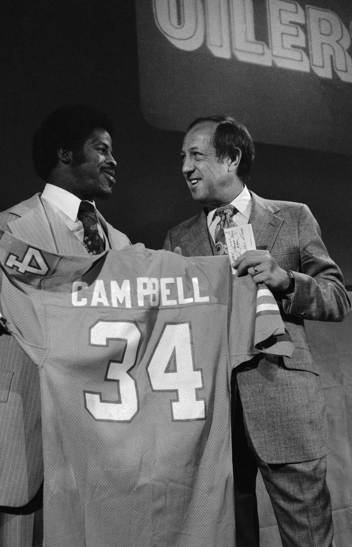 Earl Campbell, No. 1 draft choice of the Houston Oilers, at the NFL football draft with NFL Commissioner Pete Rozelle on May 2, 1978.
