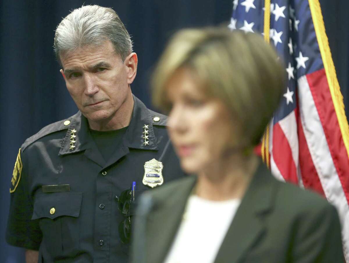 San Antonio police chief William McManus watches as city manager Sheryl Sculley addresses the media Thursday, Oct. 26, 2017 during a news conference in which she announced the city is investigating the apparent mishandling by at least one SAPD officer of more than 130 cases of alleged sexual assault and abuse in the department's Special Victims Unit.