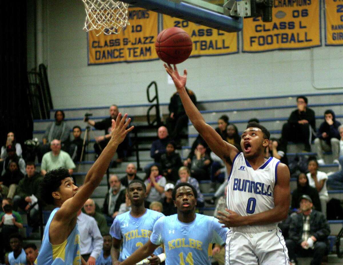 Bunnell's Khalid Moreland lays up the ball during boys basketball action against Kolbe Cathedral in Stratford, Conn., on Wednesday Jan. 3, 2018.