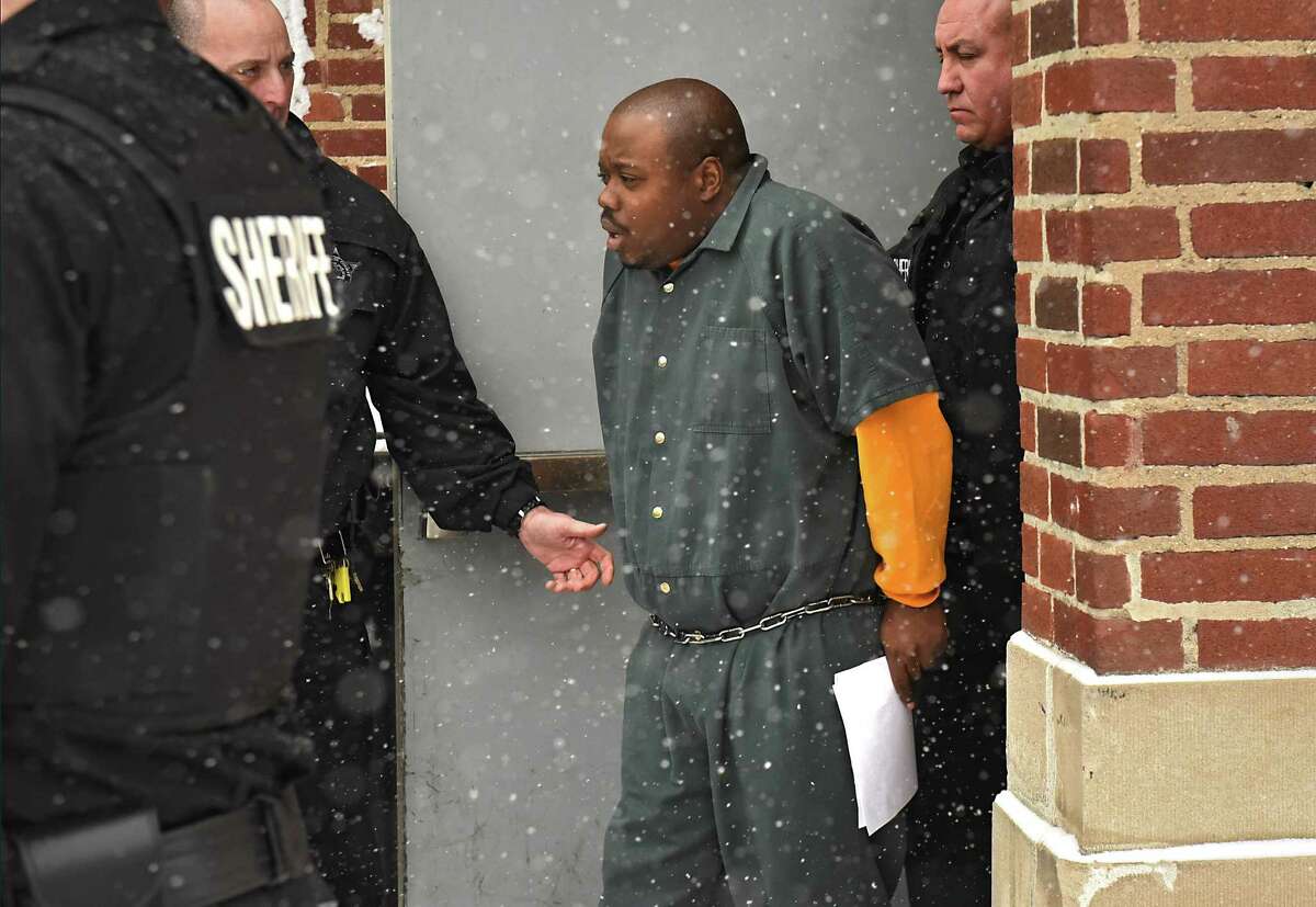 James White leaves the Troy Police Station after appearing in city court on Thursday, Jan. 4, 2018 in Troy, N.Y. White is accused of slaying four people in a Lansingburgh apartment. (Lori Van Buren / Times Union)