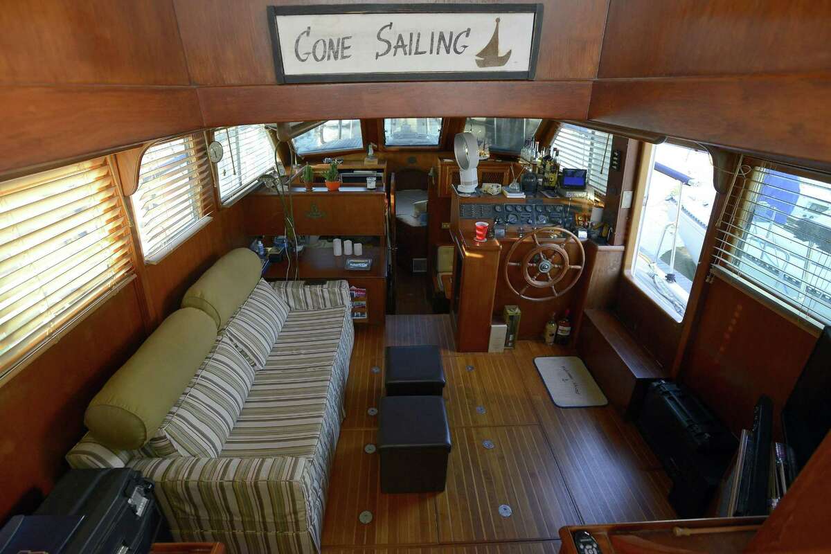 All the comforts of home for Jonathan Asch and Aileen Hutchins, who live on their boat named Huntress during the summer at Palmer Landing in Stamford, Connecticut on Friday, Sept. 22, 2017.