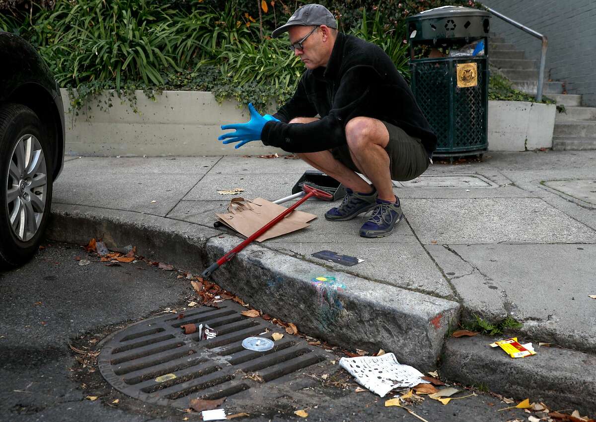 A drain at the corner of Montgomery and Vallejo streets is just down the street from the drain Mark Cormier keeps clean to prevent clogging that leads to flooded streets near his Telegraph Hill home in San Francisco, Ca. as seen on Fri. December 22, 2017. The SFPUC is pushing to get folks to "adopt" sewer drains in order to prevent flooding.