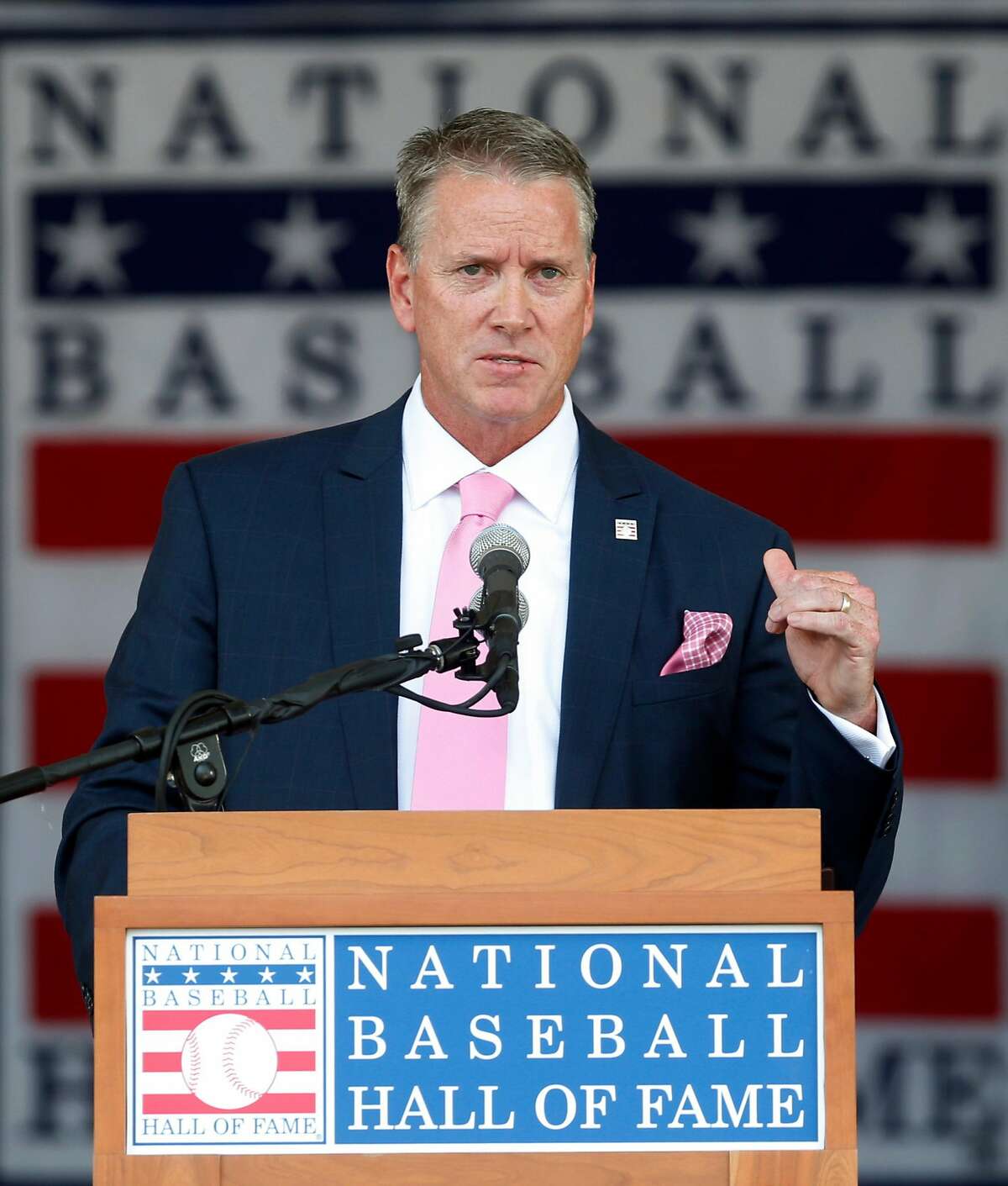 National Baseball Hall of Fame inductee Tom Glavine speaks during an induction ceremony at the Clark Sports Center on Sunday, July 27, 2014, in Cooperstown, N.Y. (AP Photo/Mike Groll)