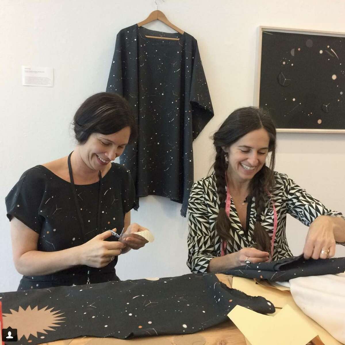 Lena Wolff (left) and Erica Tanov work on a clothing collection based on a collage Wolff created for the de Young.