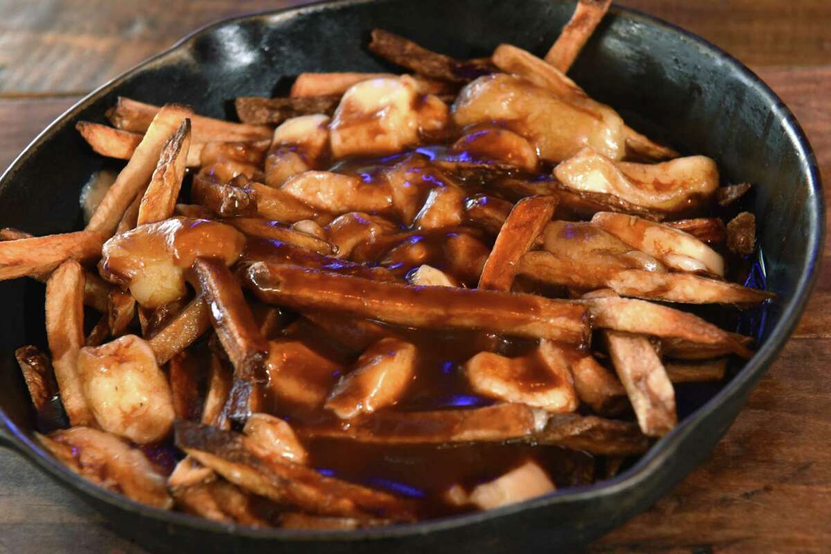 Gravy fries with smoked cheese curd at the Tipsy Moose on Wednesday, Jan. 3, 2018 in Latham, N.Y. (Lori Van Buren / Times Union)