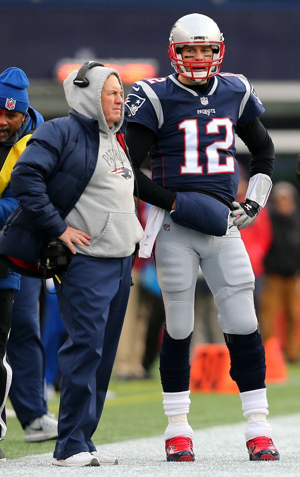 Head coach Bill Belichick of the New England Patriots stands with Tom Brady #12 during the second half against the Buffalo Bills at Gillette Stadium on December 24, 2017 in Foxboro, Massachusetts. (Photo by Maddie Meyer/Getty Images)