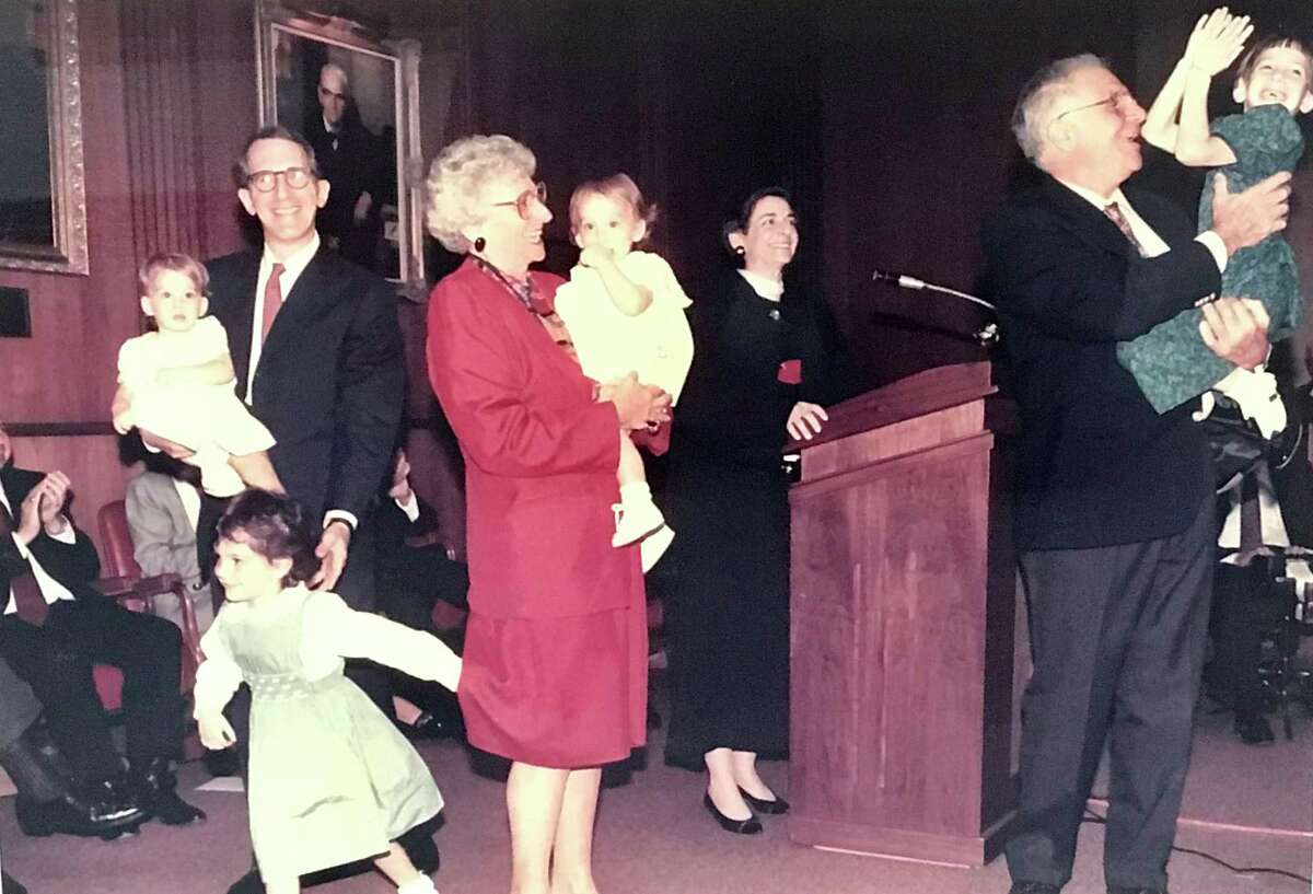 The family assembled for the investiture of U.S. District Judge Lee H. Rosenthal in 1992 at the federal courthouse in Houston. Pictured are daughter Hannah, 4, in blue dress, husband Gary is holding Rachel,1, mother Ferne Hyman is holding Jessica, 1, Rosenthal, father Harold Hyman, is holding Rebecca, 6.
