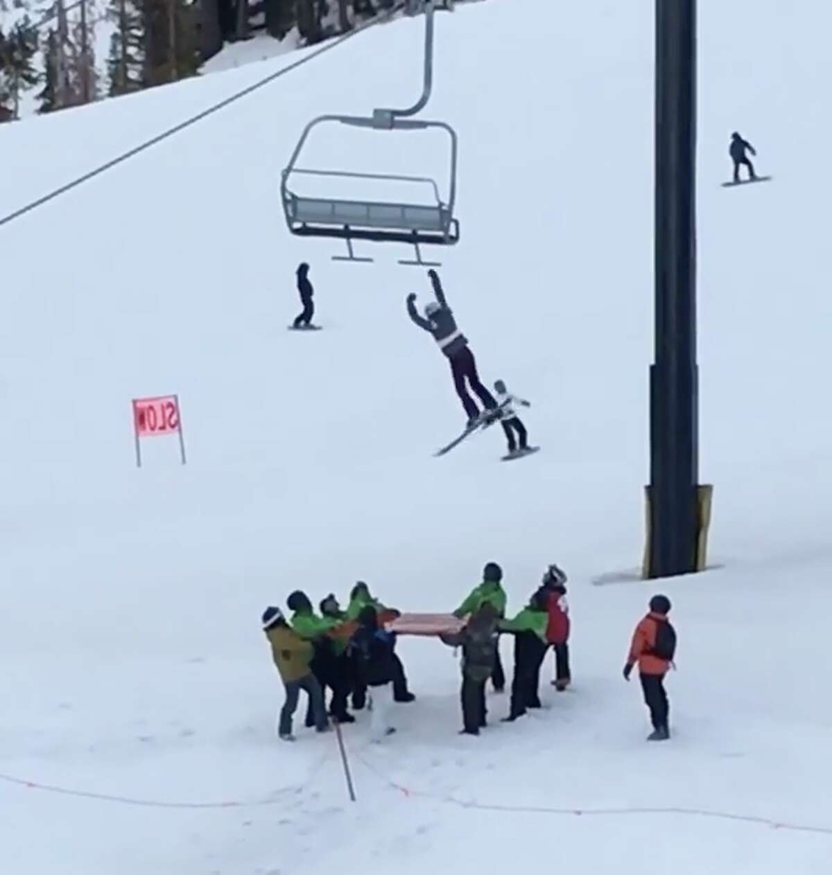 Terrifying Moment A Teen Skiier Dangles From A Mammoth Chairlift Before Dropping Into Rescue Net