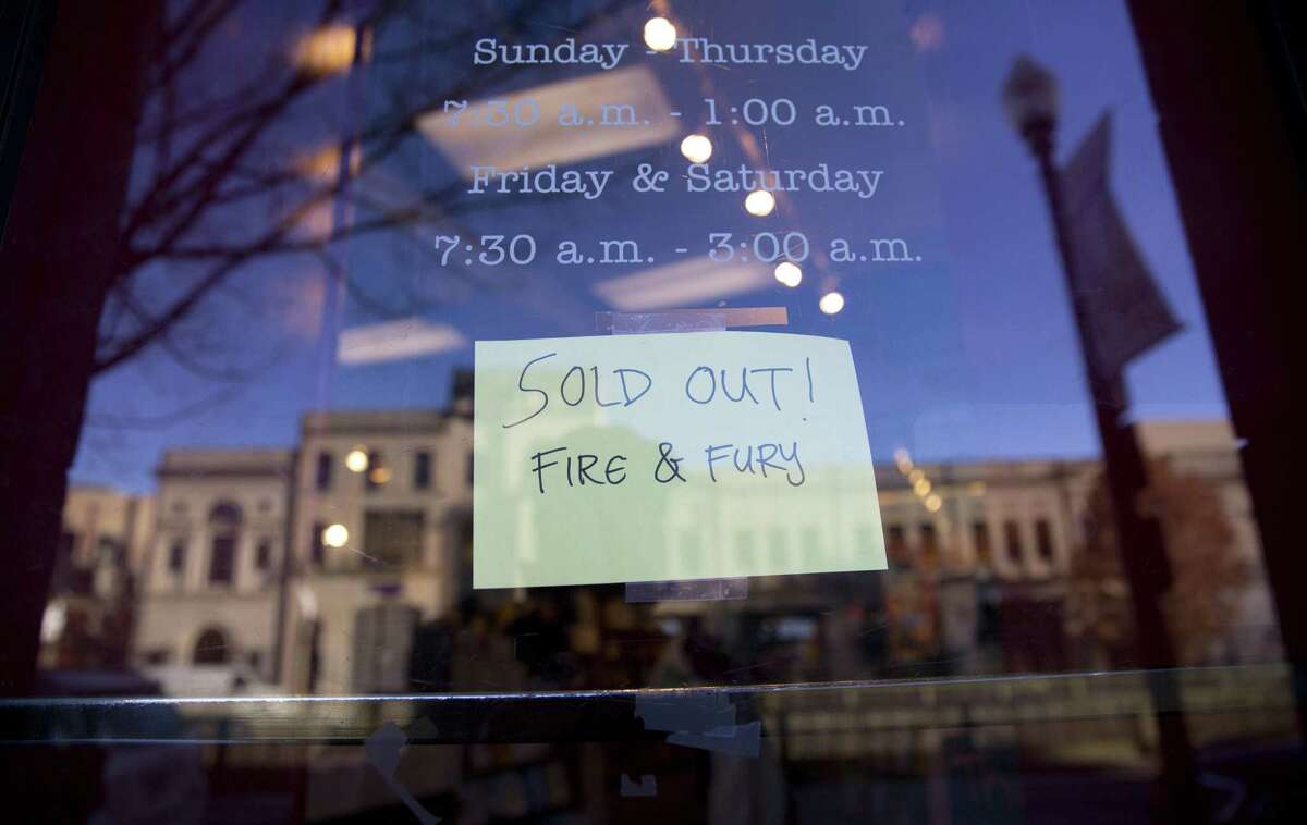 Sign posted at the door for Kramerbooks & Afterwords Cafe indicating that the book “Fire and Fury: Inside the Trump White House” is sold out at the bookstore located in the Dupont Circle neighborhood in Washington, Friday, Jan. 5, 2018.