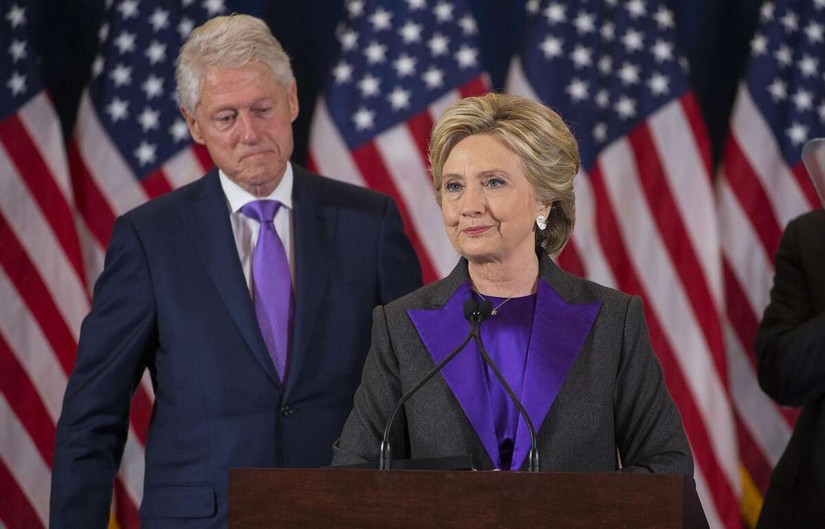 Hillary Clinton, accompanied by her husband, former President Bill Clinton, concedes the presidential election to Donald Trump in New York in this Nov. 9, 2016 file photo. FBI agents have renewed asking questions about the dealings of the Clinton Foundation amid calls from President Trump and top Republicans for the Justice Department to take a fresh look at politically charged accusations of corruption. (Ruth Fremson/The New York Times)