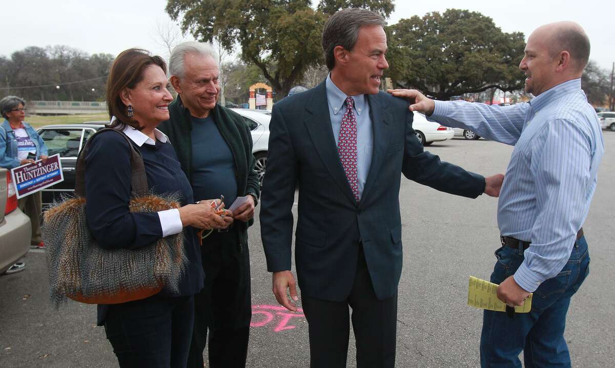Joe Straus (center), Speaker of the Texas House of Representatives, talks with Jorge Canseco (right) at Lions Field Park on the last day of early voting in the March 2014, the last gubernatorial election. Standing on the left are Jan and Bob Marbut. This year, Texas is again at the forefront of primary races in the nation, with election set for March 6. Early voting starts Feb. 20.