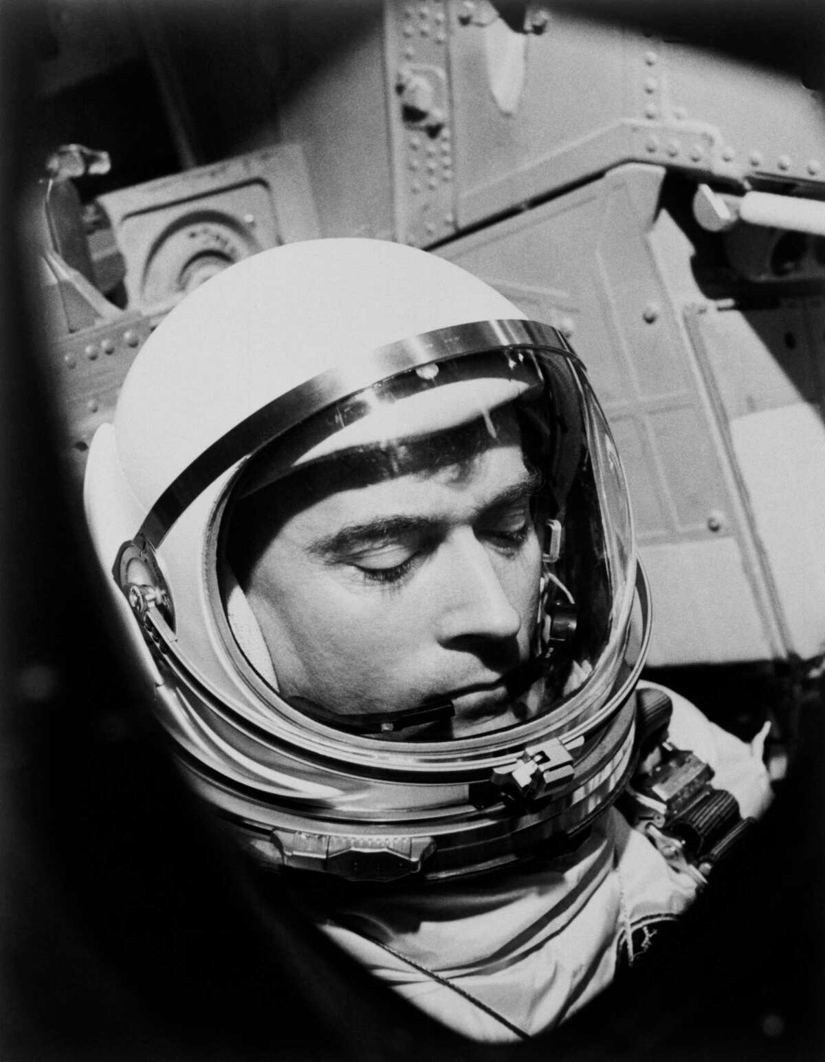 This 1965 photo made available by NASA shows John Young during the Gemini 3 mission. NASA says the astronaut, who walked on the moon and later commanded the first space shuttle flight, died on Friday, Jan. 5, 2018. He was 87.
