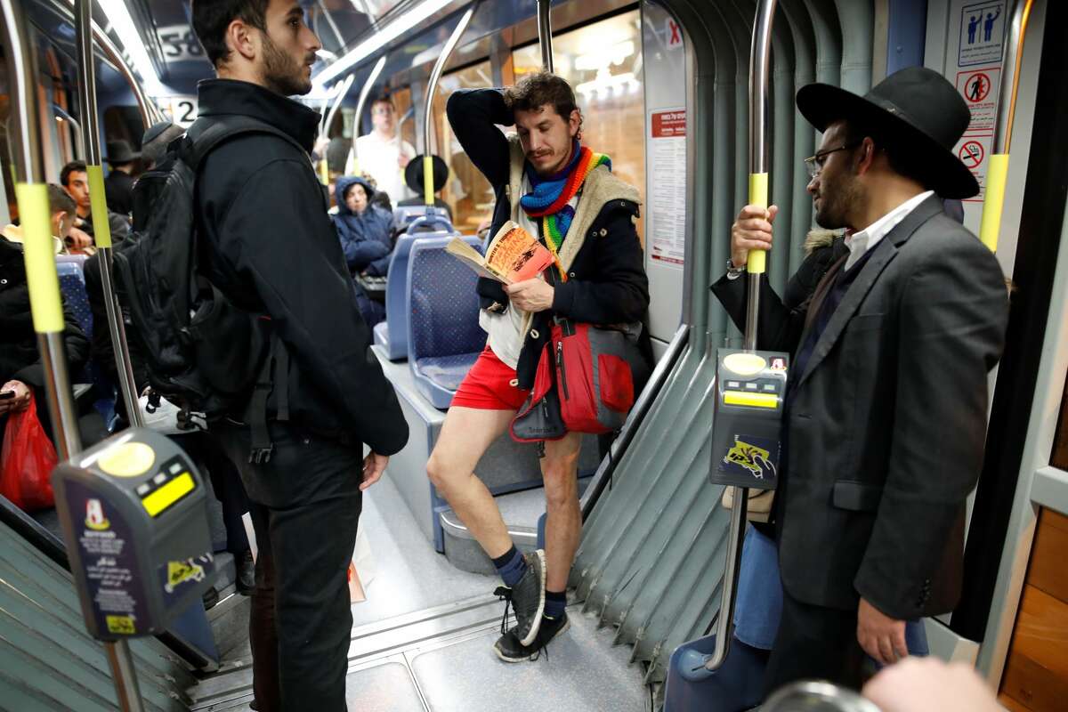 Pantsless Passengers Take Over Bart Photos From No Pants Subway Ride Around The World