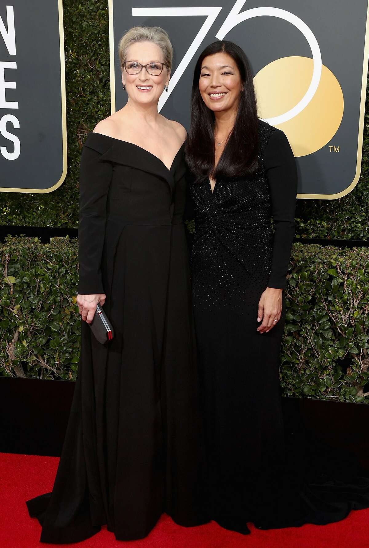BEVERLY HILLS, CA - JANUARY 07: Meryl Streep (L) and Ai-jen Poo attends The 75th Annual Golden Globe Awards at The Beverly Hilton Hotel on January 7, 2018 in Beverly Hills, California. (Photo by Frederick M. Brown/Getty Images)