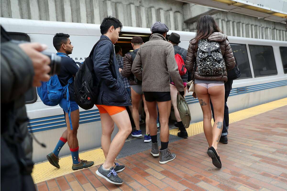 No Pants! Subway Ride 2018 participants board a BART train at Balboa station in San Francisco, Calif., on Sunday, January 7, 2018.
