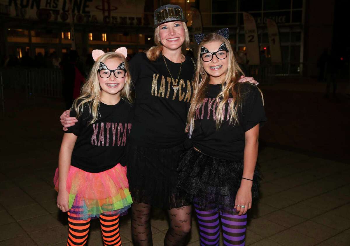 Katy Perry fans pose for a photo before the "Witness: The Tour" concert at Toyota Center on Sunday, Jan. 7, 2018, in Houston.