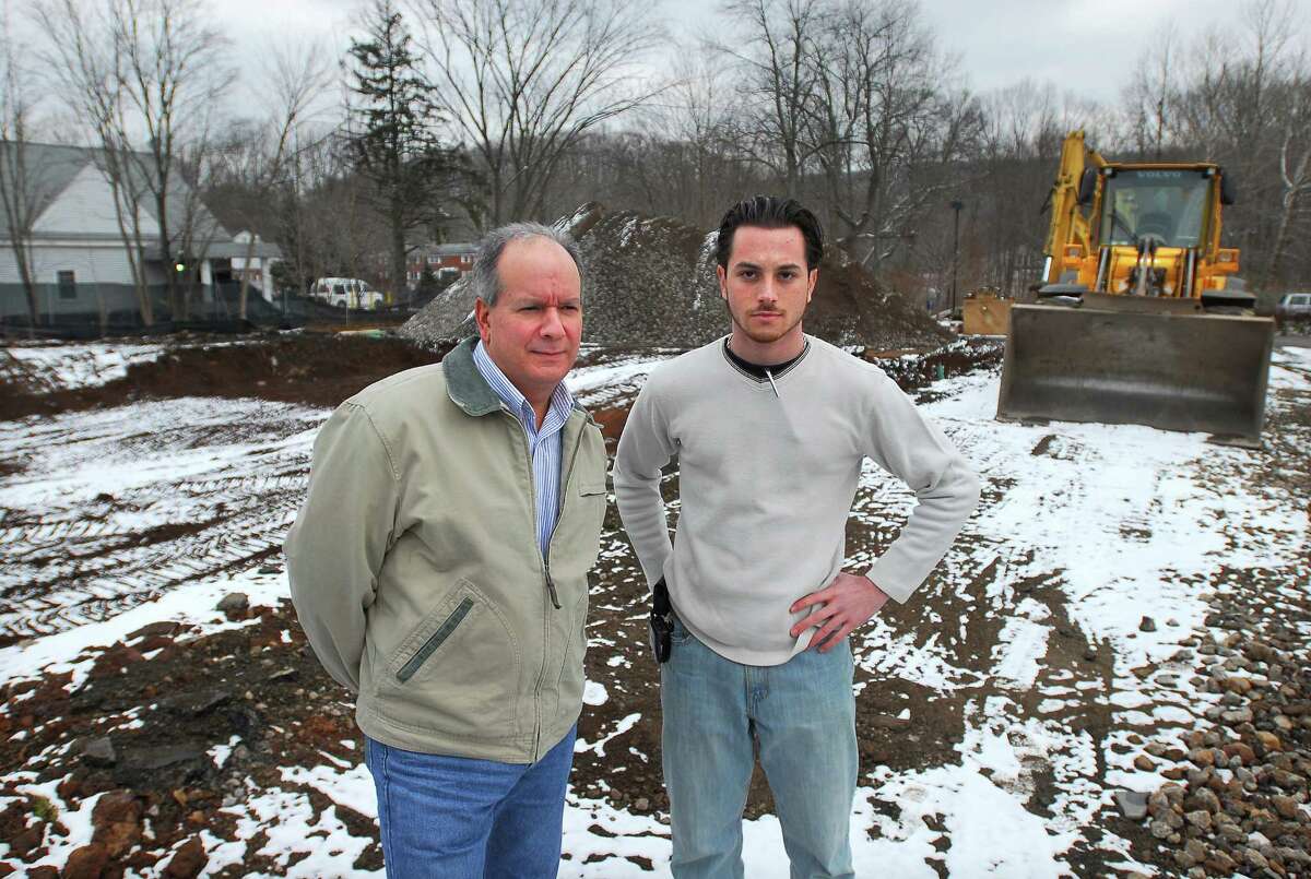 Cas100203 02/03/10 Northford-- Property owner Nick Demos, left, and Project Manager Michael DiGioia are hoping to get Demos' store rebuilt after a fire destroyed it in 2008. Photos -Peter Casolino/New Haven Register ***SEE STORY