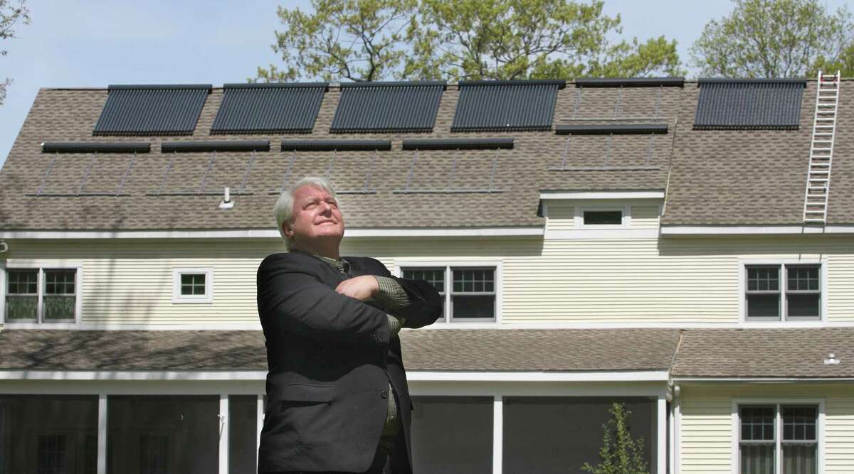 Cas080513 5/13/08 Guilford--Stephen Elkin, CEO of the U.S. Subsidary of Apricus, Inc., has his own product on his Guilford home. An Evacuated Tube Heating and Hot Water Solar System. Photo-Peter Casolino
