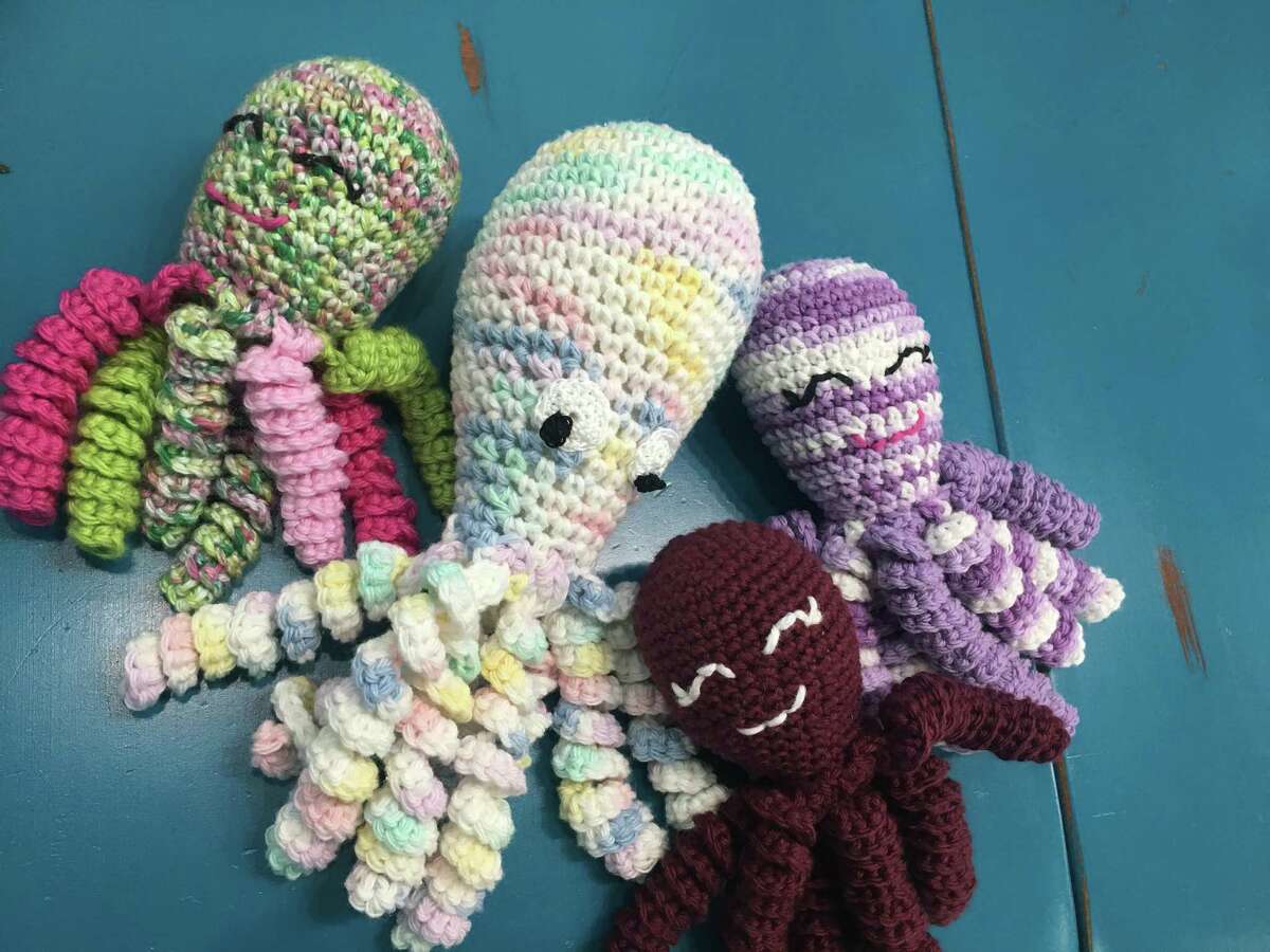 Cindy Fontaine, owner of Silsbee's In The Loop craft store, has been working with volunteer crocheters to create small octopuses for premature babies in the hospital. Studies show that the sea creature being with a developing baby in the crib can help level heart rates, increase oxygen levels and speed up the formation of vital organs. Photo: Morgan Gstalter/Beaumont Enterprise.