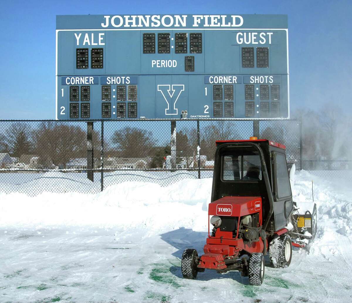 cit-enterprise-ag-1/21/09 Sue Imperati operates a snow thrower to clear snow from the edges of Johnson Field off of Central Ave. in New Haven on 1/21/2009. Photo by Arnold Gold AG0296D