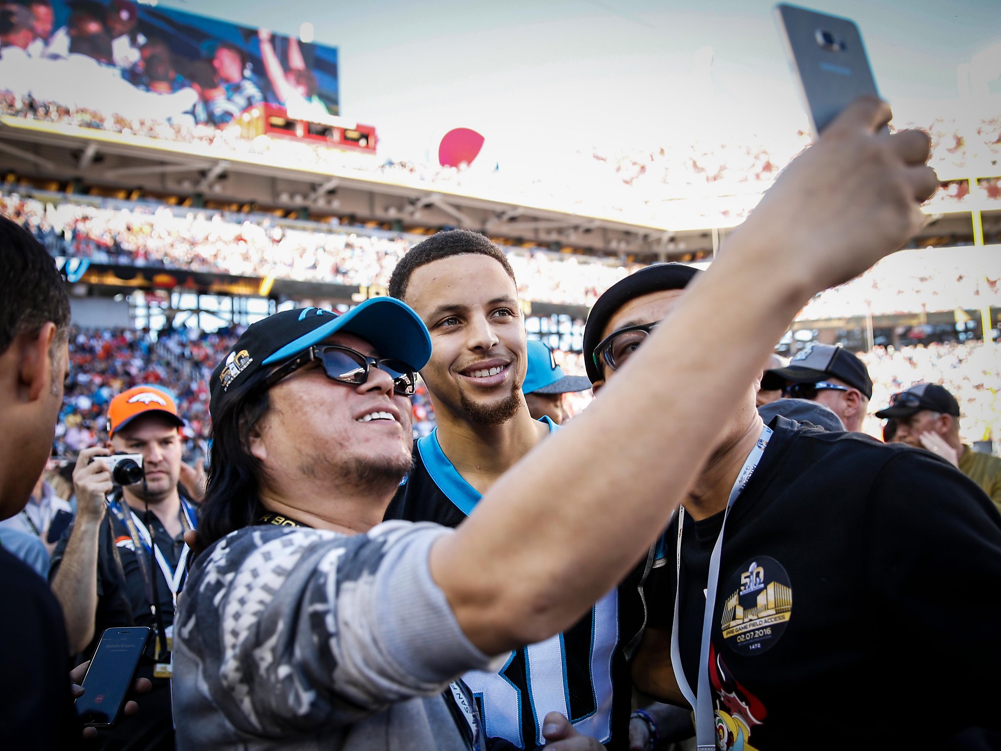 Ayesha and Stephen Curry are seen on the sideline before Super Bowl 50  between the Carolina Panthers and the Denver Broncos at Levi's Stadium on  Sunday, Feb. 7, 2016 in Santa Clara