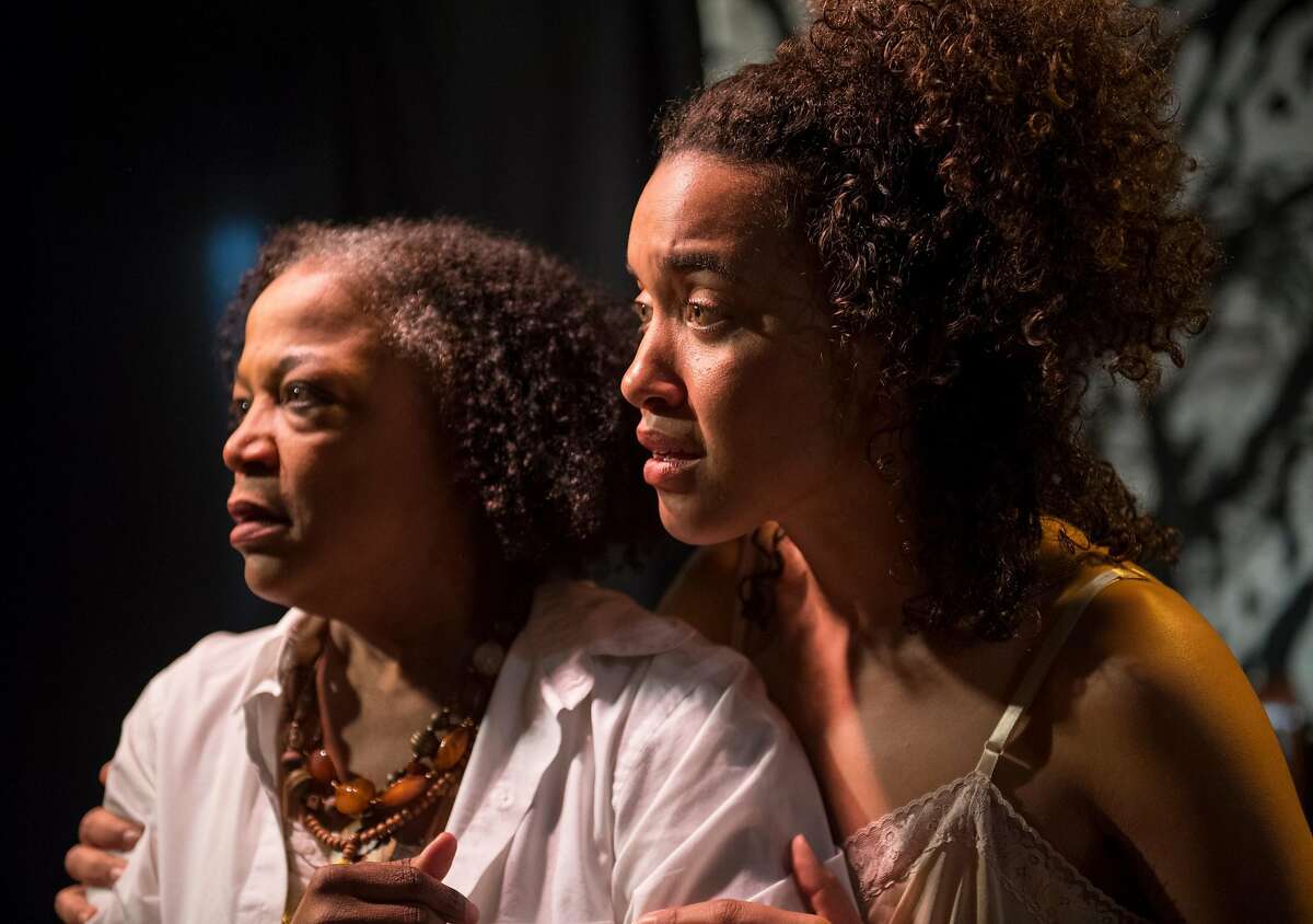 Zuri (Dezi Sol�y, right) urges Azucar (Cathleen Riddley) to give up her place of rest�and create a different future in AlterTheater's "Bondage."