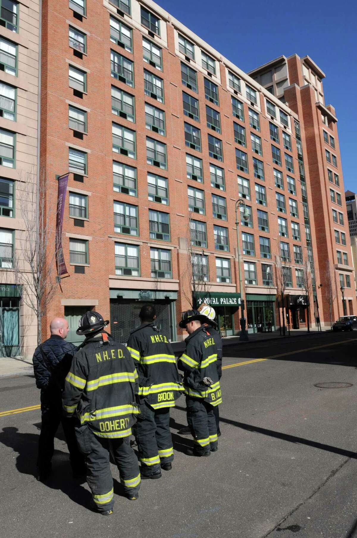The smell of gas caused evacuation of the first block of Orange St., including the apartment building at #44. Residents were allowed back in around 11am. Mara Lavitt/New Haven Register 3/13/13