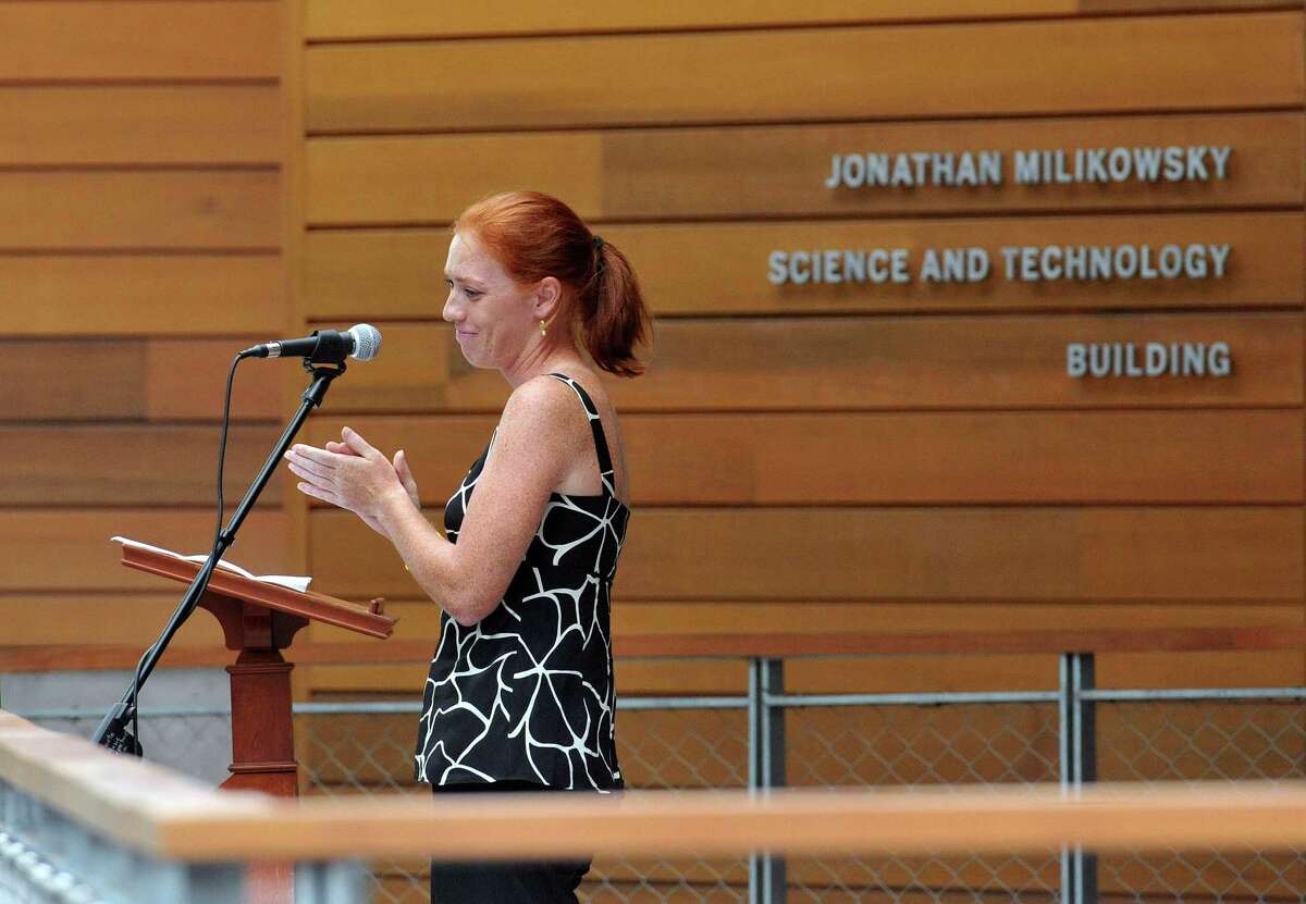 New Haven-- Jennifer Milikowsky speaks about her brother during the dedication of the new Jonathan Milikowsky Science and Technology Building. Jonathan Milikowsky, a Foote School student, died of cancer in 2006. Photo Peter Casolino/New Haven Register 09/08/2012