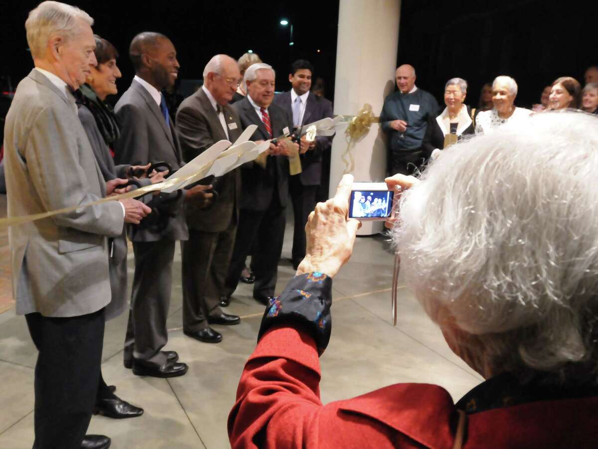 The Whitney Center held a grand opening and ribbon cutting with local politicians and administrators of its new residential building in Hamden. Photo by Mara Lavitt/New Haven Register 11/10/11