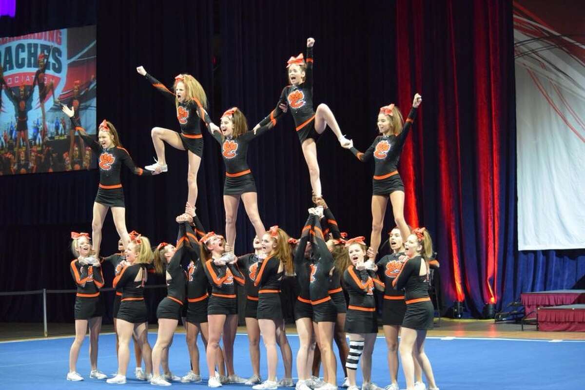 The Edwardsville High School Varsity and Junior Varsity Cheerleading squads competed at the Illinois Cheerleading Coaches Association, ICCA, State Championships on January 6-7, 2018 at the Bank of Springfield Center in Springfield, Illinois. Varsity placed second in the State in the Large Varsity Division, while Junior Varsity placed third in the State in the Large Junior Varsity Division. Due to Sunday's weather conditions, JV did not have a photo taken with their trophy but a performance photo was taken.