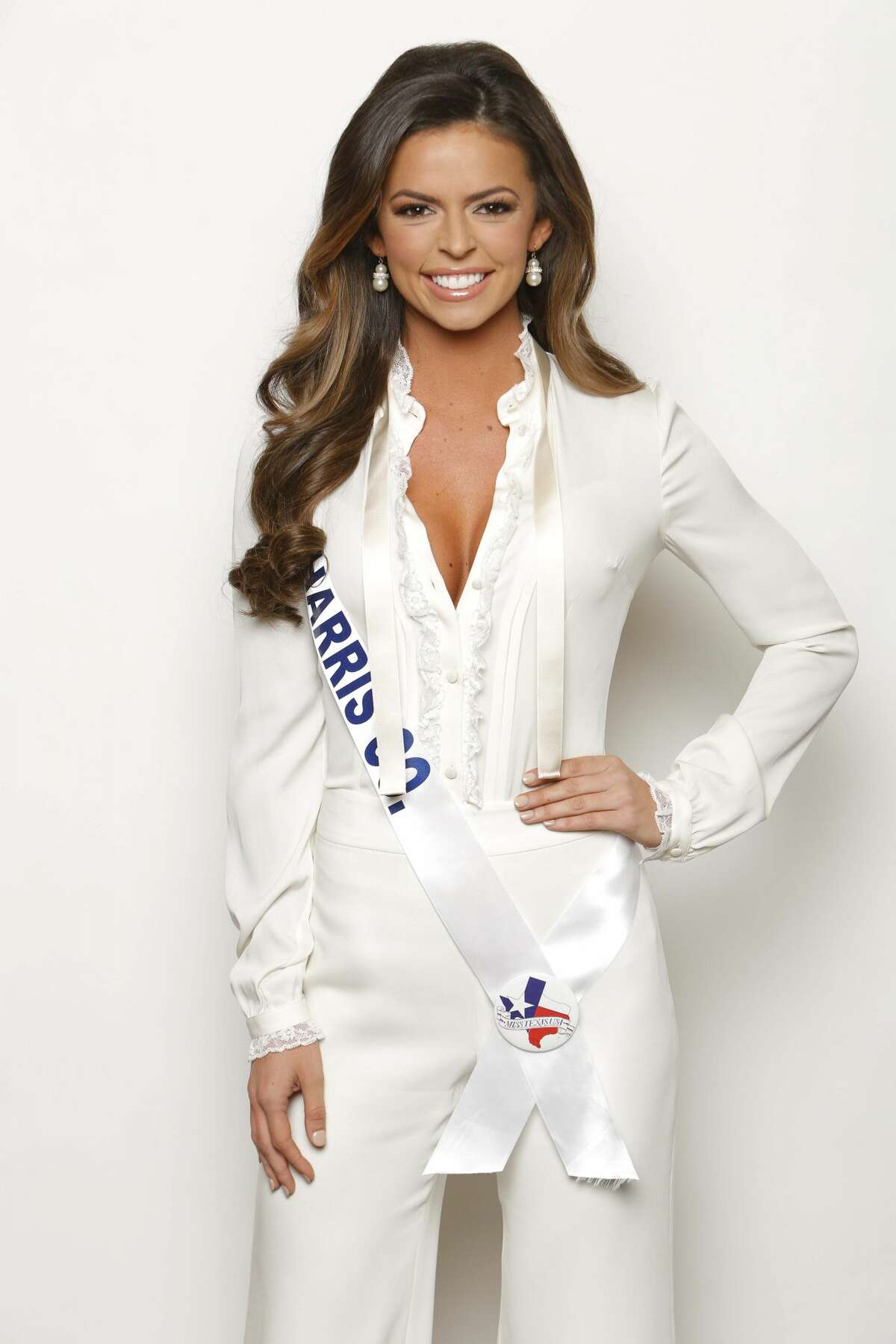 Miss Texas, Houston real estate mogul Logan Lester, throws out first