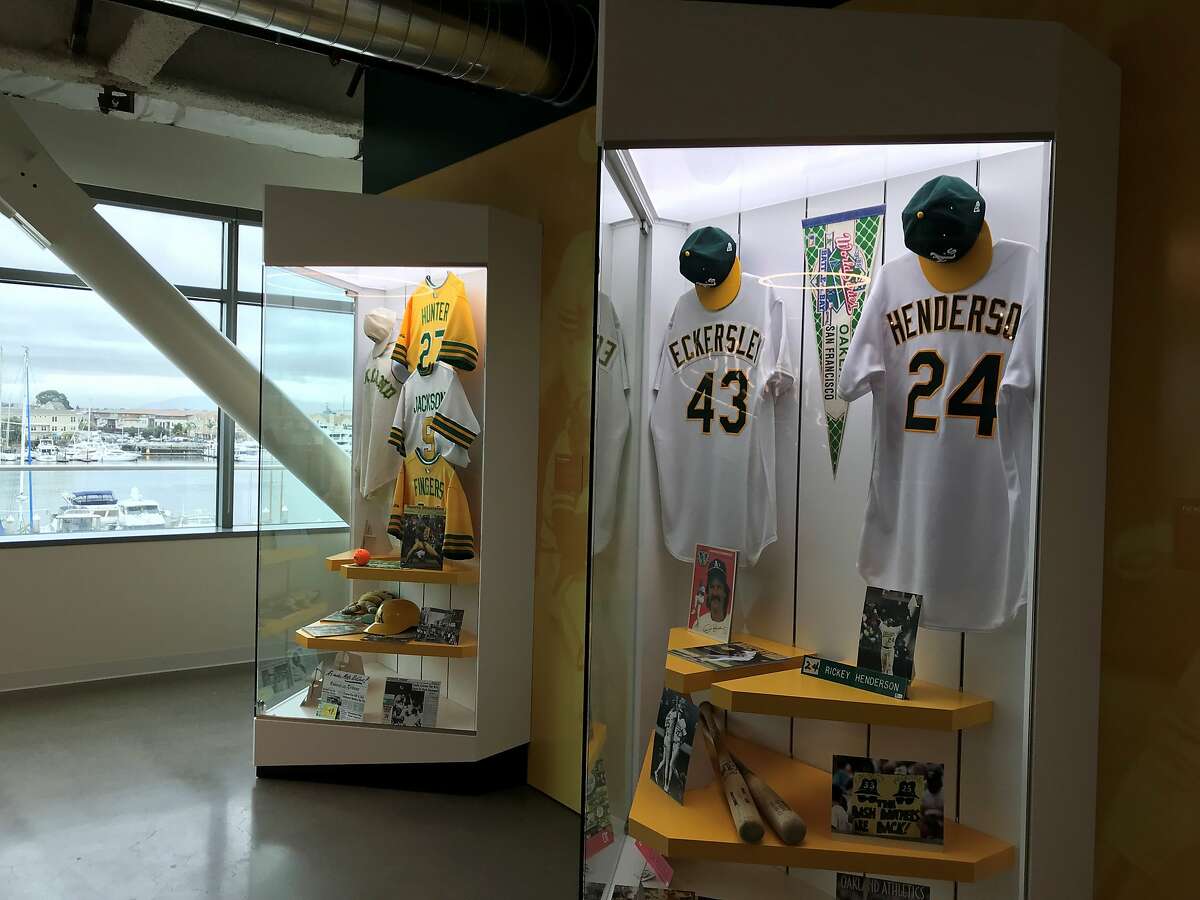 The A's moved into new offices in Jack London Square this week. Amenities include a gym, a batting cage, a mural by street-art crew the Illuminaries and team memorabilia displays, including, as pointed out by team president Dave Kaval, the orange baseball proposed by former owner Charlie Finley.