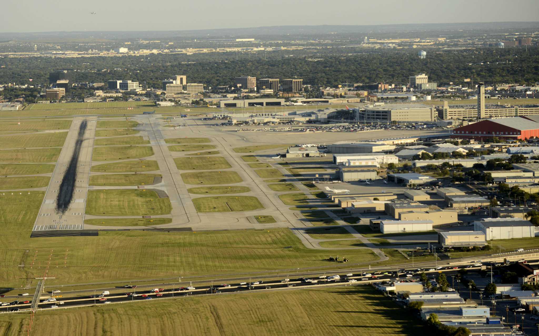 A San Antonio airport expansion could require 200 neighboring acres