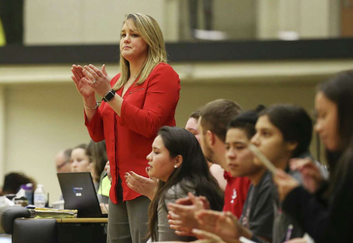 Lee girls basketball coach Dru Weeaks supervises her team against Johnson in girls basketball at Littleton Gym on Tuesday, Jan. 8, 2018. Lee defeated Johnson, 76-51, in district play. (Kin Man Hui/San Antonio Express-News)