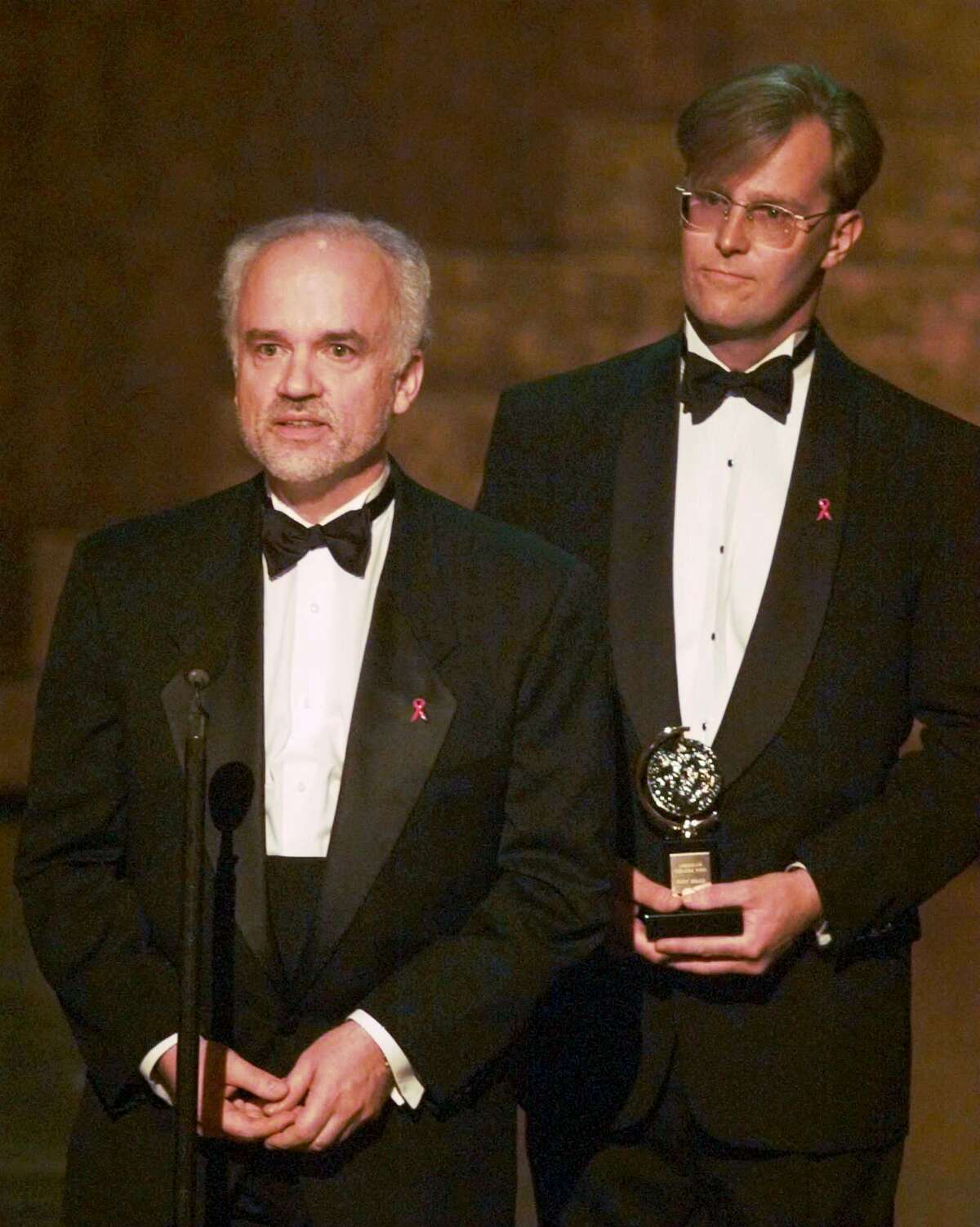 Gregory Boyd, left, and Paul Tetrault of Houston's Alley Theater accept the Regional Theater Award for at the 50th Annual Tony Awards in New York Sunday, June 2, 1996. (AP Photo/Ron Frehm)