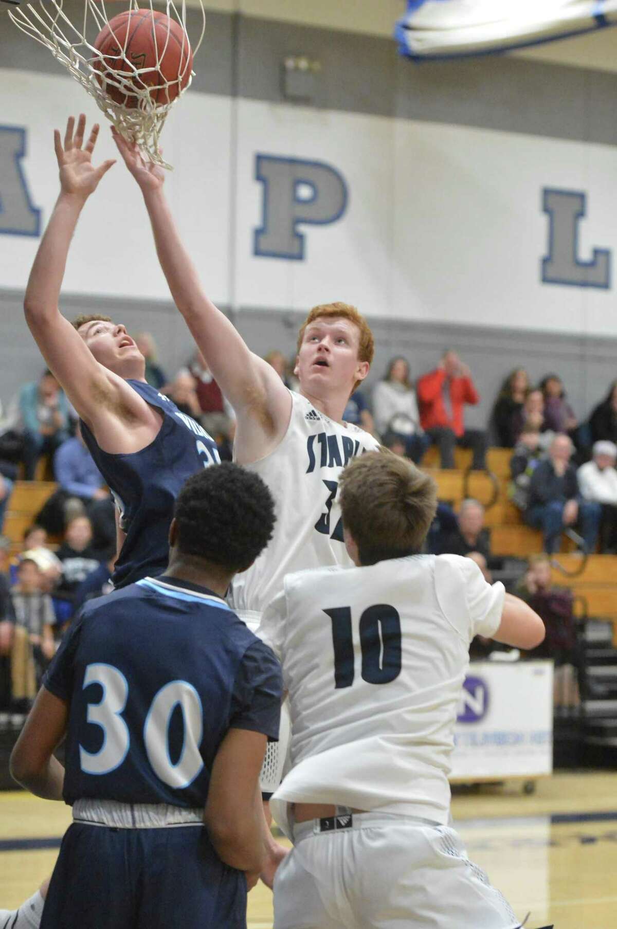 Boys Basketball: Wilton shoots lights out in win over Wreckers